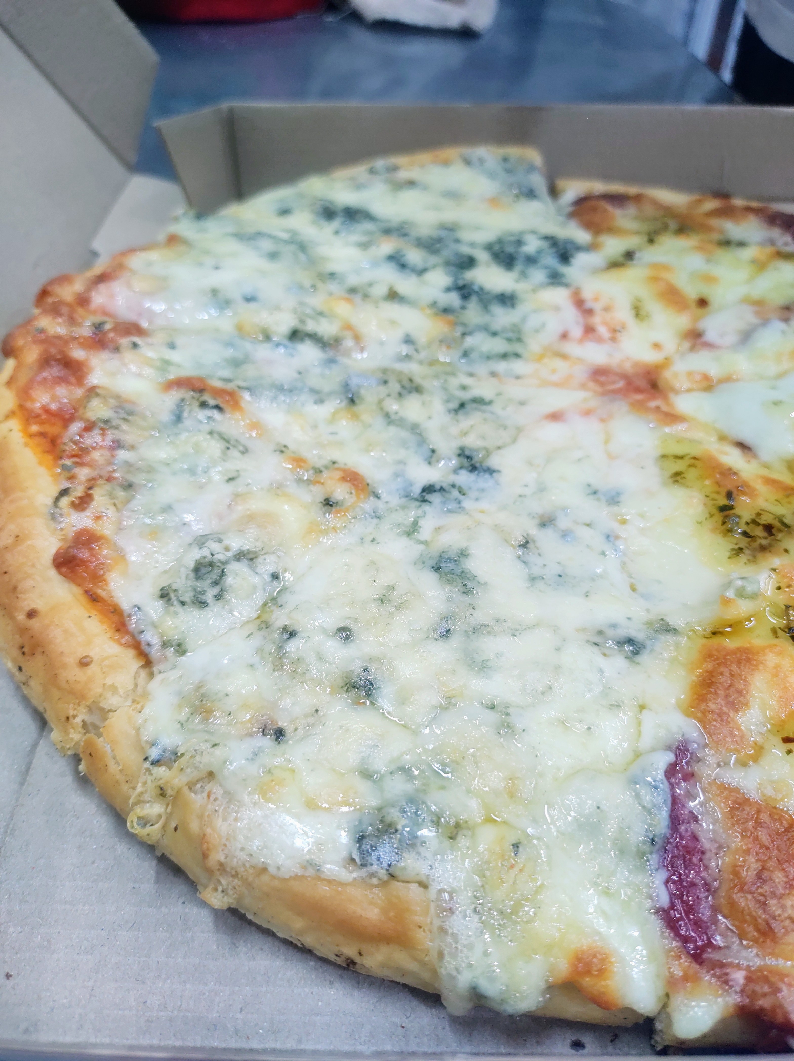 Four cheese deep-dish pizza